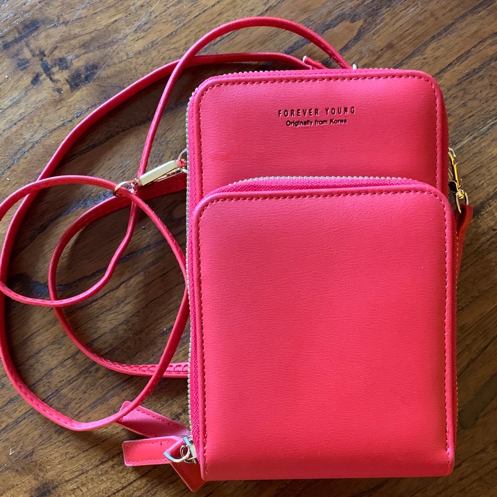 ✨2/$20✨ 
Small red crossbody bag with three separate compartments and strap
